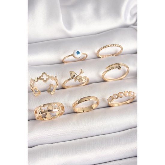 Pirinç Gold Renk Nazar Boncuk Model Kuş Detay Kadın Yüzük Kombini Pirinç Gold Renk Nazar Boncuk Model Kuş Detay Kadın Yüzük Kombini