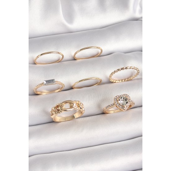 Pirinç Gold Renk Zirkon Taşlı Kalp Figür Düğüm Detay Kadın Yüzük Kombini Pirinç Gold Renk Zirkon Taşlı Kalp Figür Düğüm Detay Kadın Yüzük Kombini